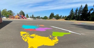 completed painted map of the world on Rainier View playground